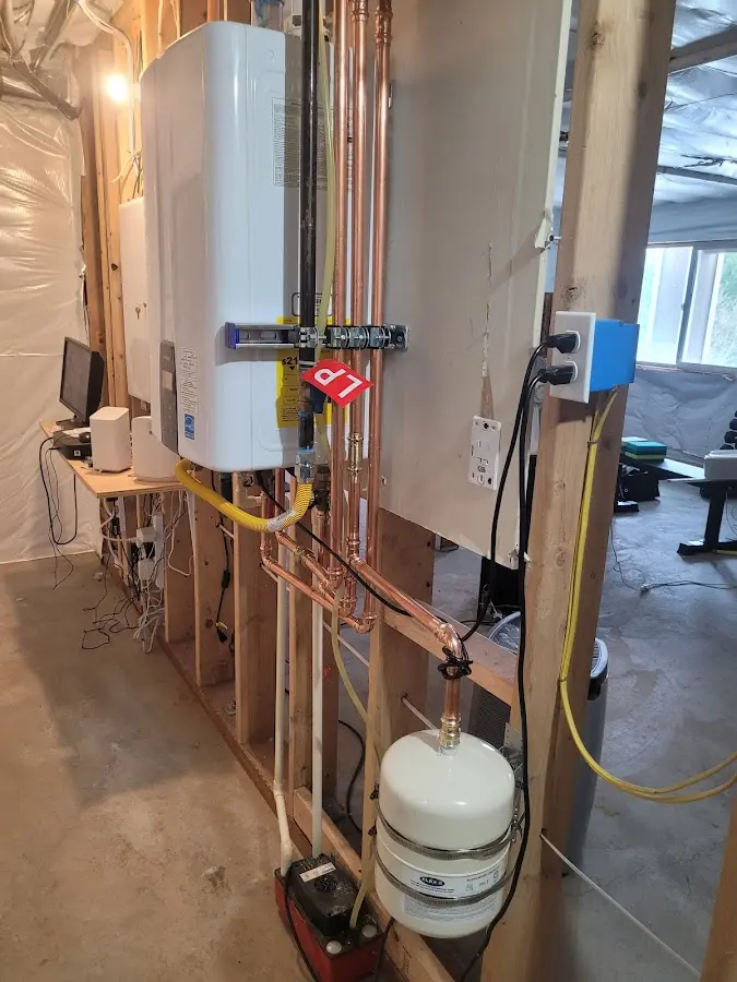 Licensed plumber repairing a kitchen sink in Palermo